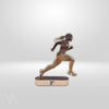 Trophée personnalisé en bois pour running femme gamme Starter socle bronze en studio Vulka